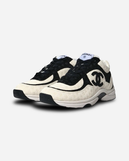 Chanel CC Logo Sneaker 'Black and White CC Embossed Monogram'